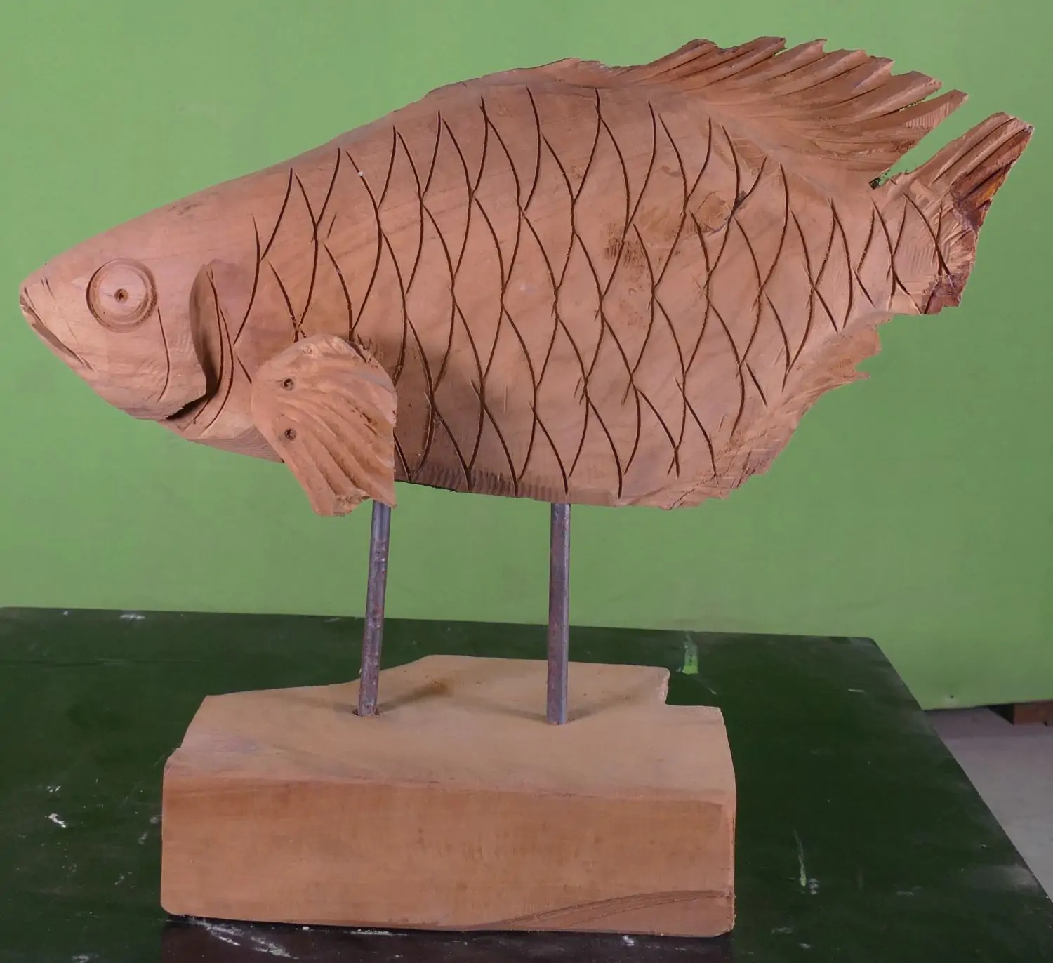  Product image 6 of the product “Carved tilapia wood on stand ”